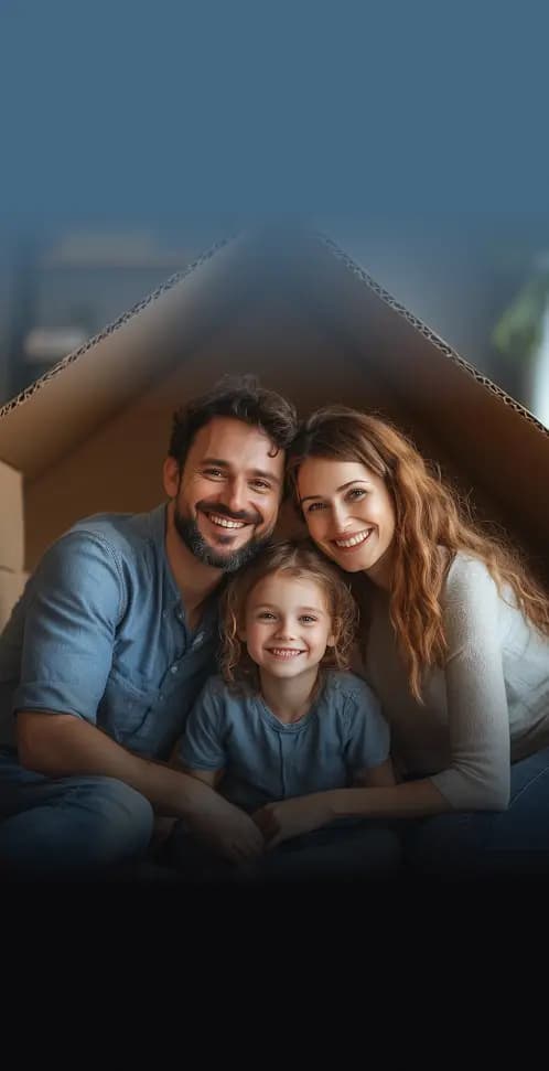 Family standing in front of their new home